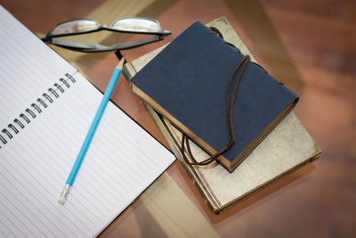 High angle view of book on table