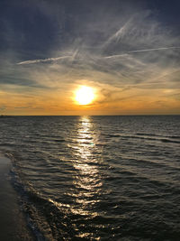 Scenic view of sea against sky during sunset