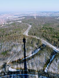 Aerial view of trees on landscape against sky