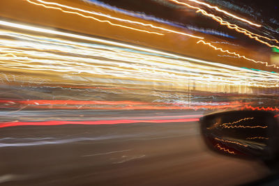 Aerial view of illuminated car window at night