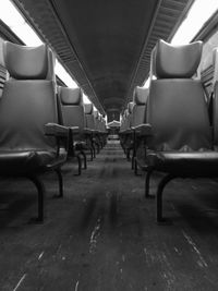 Empty chairs in corridor