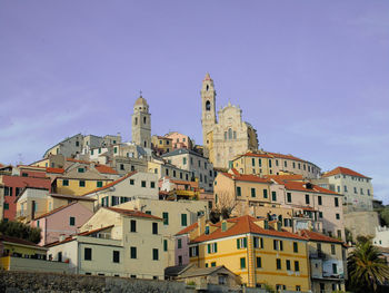 View of buildings in city against sky