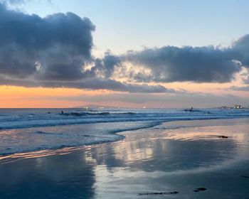 Scenic view of sea against sky during sunset