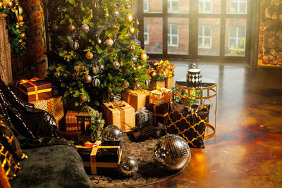 View of illuminated christmas tree at home