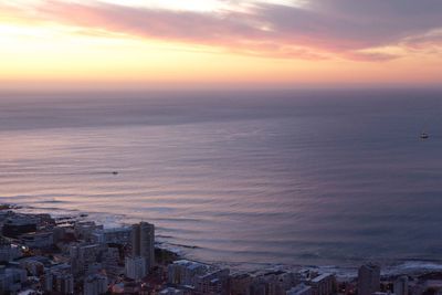 High angle view of city at sunset