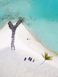 High angle view of text on beach