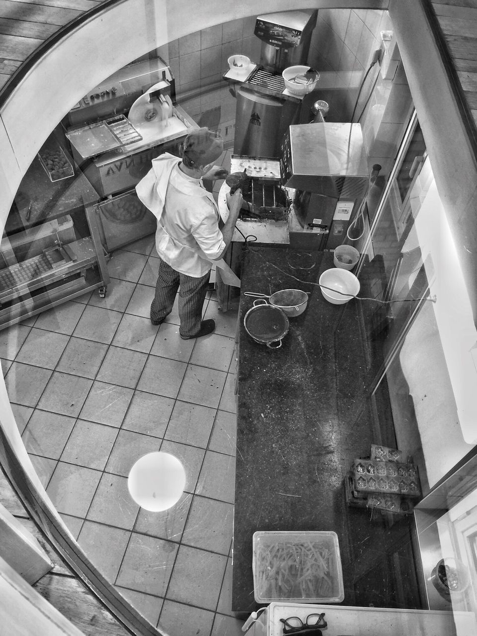 HIGH ANGLE VIEW OF BOY IN GLASS