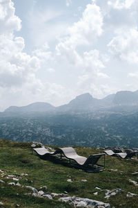 Scenic view of landscape and mountains against sky