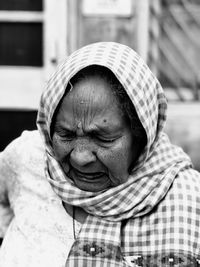 Close-up of senior woman wearing scarf