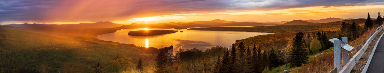 Panoramic view of mountains against sky during sunset