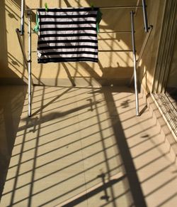 Low section of person on tiled floor