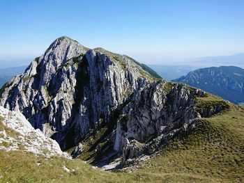 Panoramic view of rock formations against sky