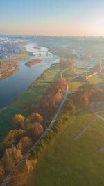 Aerial view of land on field against sky