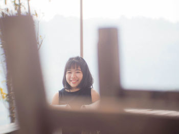 Portrait of a smiling young woman