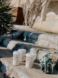 Garbage on stone wall of building