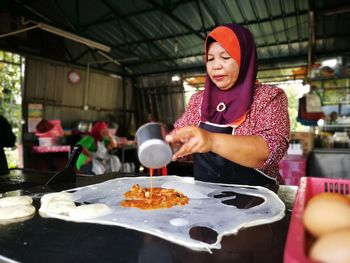 Man working in tray