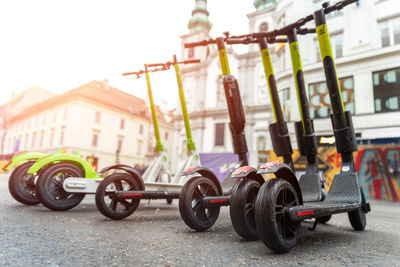 Close-up of bicycles on street