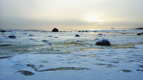 Scenic view of sea against sky during sunset