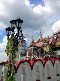 Low angle view of building against cloudy sky