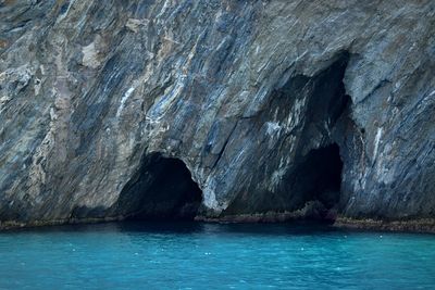 Rock formation on blue sea