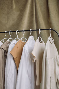 Close-up of clothes hanging on rack