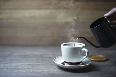 Coffee cup on table