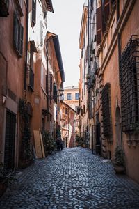 Street amidst buildings in city-rome 