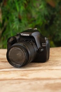 Close-up of camera on table
