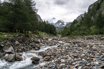 Scenic view of river stream against sky