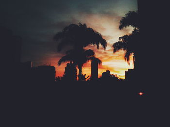 Silhouette of buildings at sunset