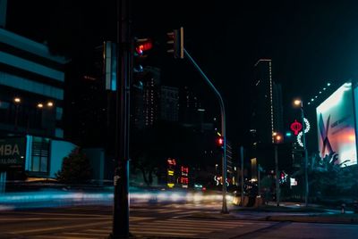 Light trails on city street at night