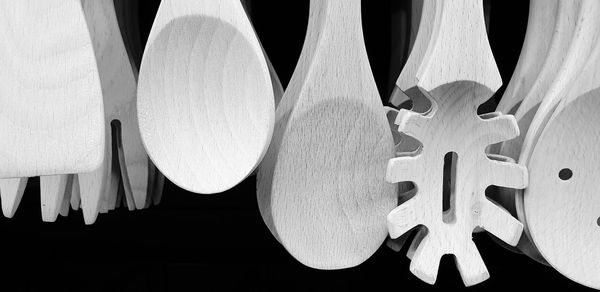 Low angle view of decoration hanging against black background