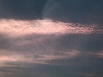 Low angle view of clouds in sky during sunset