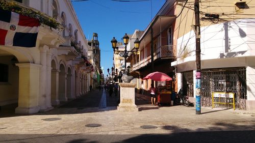 Panoramic view of colonial city against sky