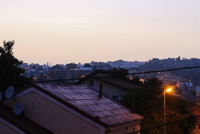 High angle view of illuminated buildings against sky