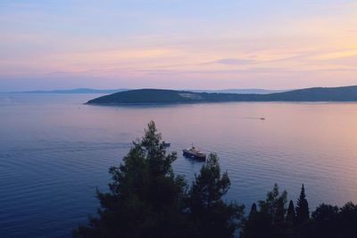 Scenic view of sea against sky at sunset