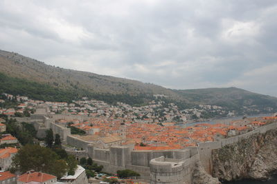 High angle view of residential district against sky