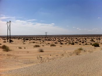 Scenic view of desert against sky