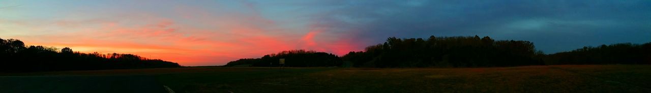 Scenic view of landscape at sunset