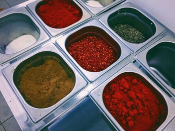 High angle view of multi colored candies in container