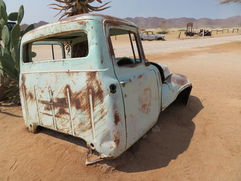 Abandoned car on land