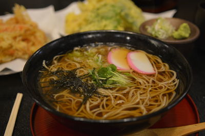 Close-up of noodle soup in bowl on table