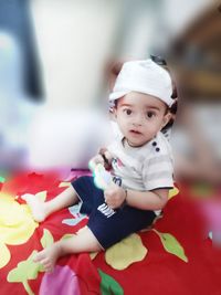 Cute baby girl with toy