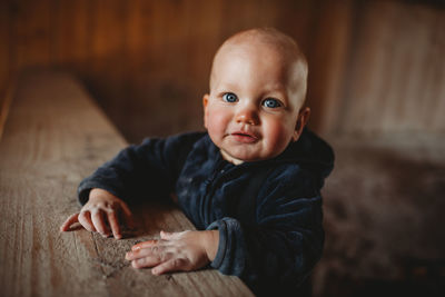 Portrait of cute baby boy at home