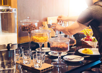 Close-up of wine glasses on table in restaurant