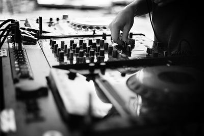 Midsection of person playing music