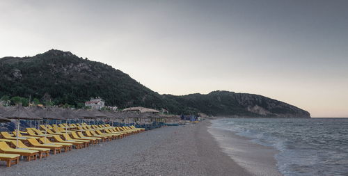 Scenic view of beach against clear sky