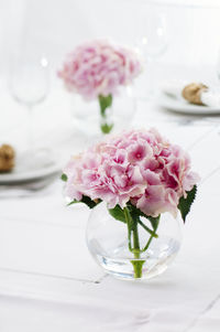 Close-up of flower vase on table