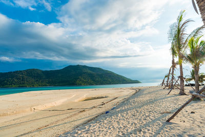 Scenic view of beach against sky