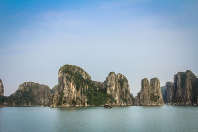 Scenic view of bay against clear sky